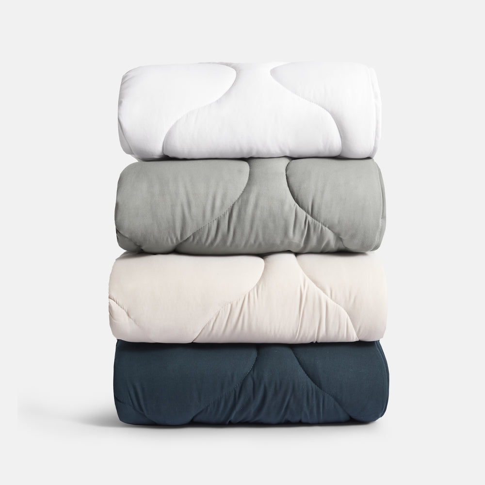 Couverture douillette matelassée en gris